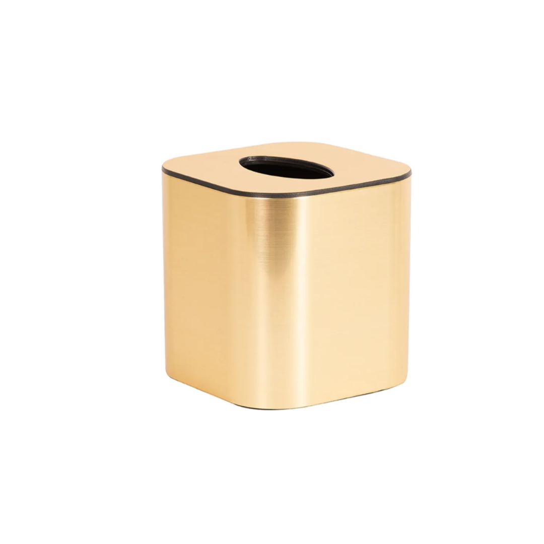 Gold-colored tissue box on a white background