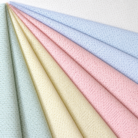 Pictured: Bariatric Knitted Fitted Sheets laid on top of each other so that the colors are peeking out. The colors from left to right are: seafoam, yellow, red, blue, white. 
Note: We only carry seafoam and white.