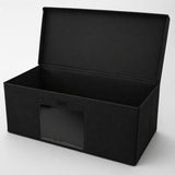 Black storage box with a lid on a white background