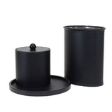 Two black cylindrical containers with a lid on a white background