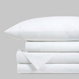 Blackfin by Boston Textile White bed sheets and pillowcase set on a light gray background