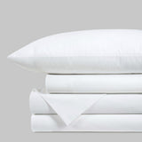 Blackfin by Boston Textile White bed sheets and pillowcase set on a light gray background