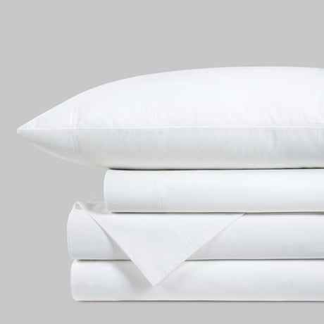 Blackfin by Boston Textile White bed sheets and pillowcase set on a light gray background