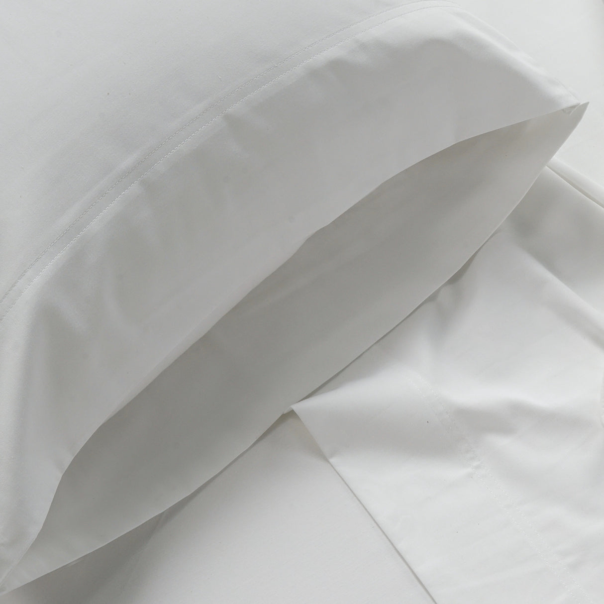 Close-up of Blackfin white bedding by Boston Textile