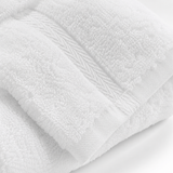Close-up of a white towel with visible texture