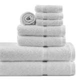 Stack of white towels on a white background