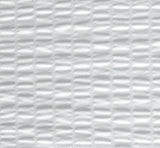 A close-up of a white textured material with a repeating wavy, ribbed pattern.