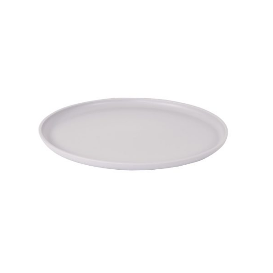 White ceramic plate on a white background