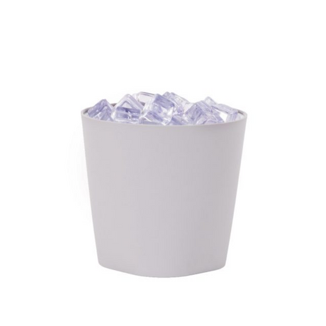 White paper cup filled with ice cubes on a white background