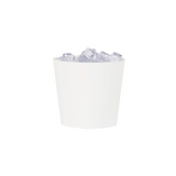 White ice bucket filled with ice cubes on a white background