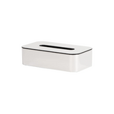 White tissue box with black accent on a white background