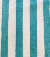 Close-up of a fabric with blue and white vertical stripes.