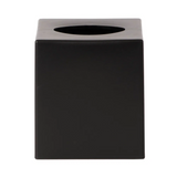 Black cube-shaped object with a metallic top on a white background
