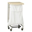Pictured: A white hooded self-closing fluid resistant laundry bag on wheels with a metal frame, with a plastic white top.