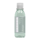 Pictured: Infuse Shampoo bottle with clear flip cap against a white background.