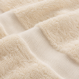Close-up of beige textured fabric