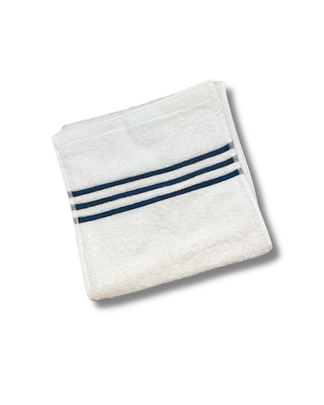White towel with three blue stripes on a white background