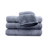 Set of gray towels stacked on a white background