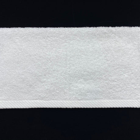 Close-up of a white textured band on a black background