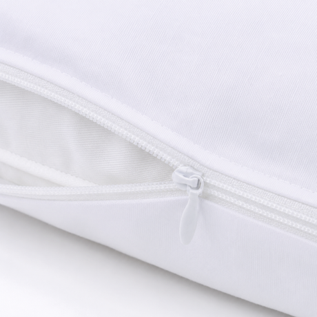 Close-up of a white fabric with a zipper on a light gray background