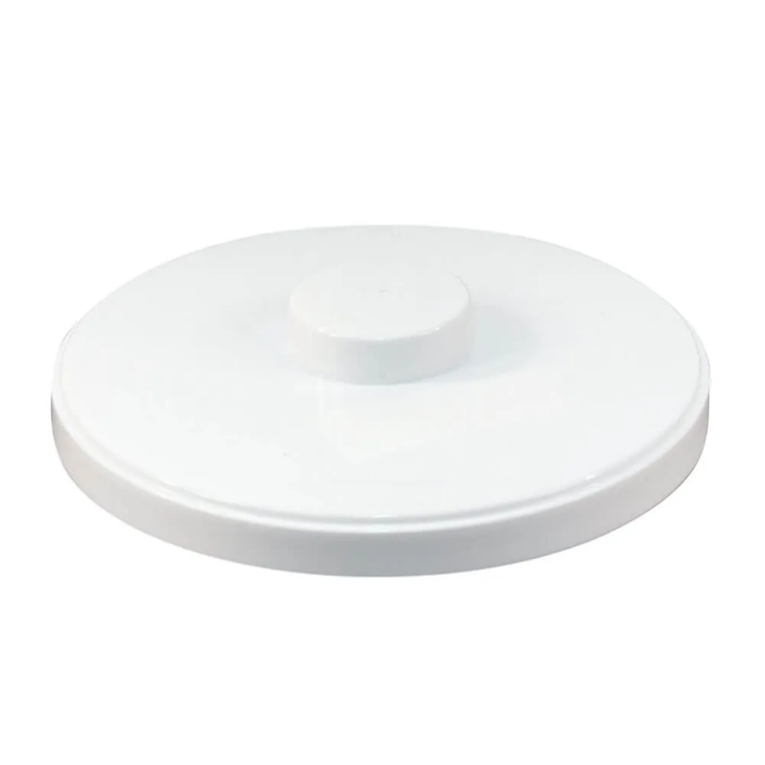 White ceramic plate on a white background