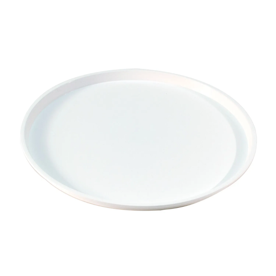 White ceramic plate on a white background