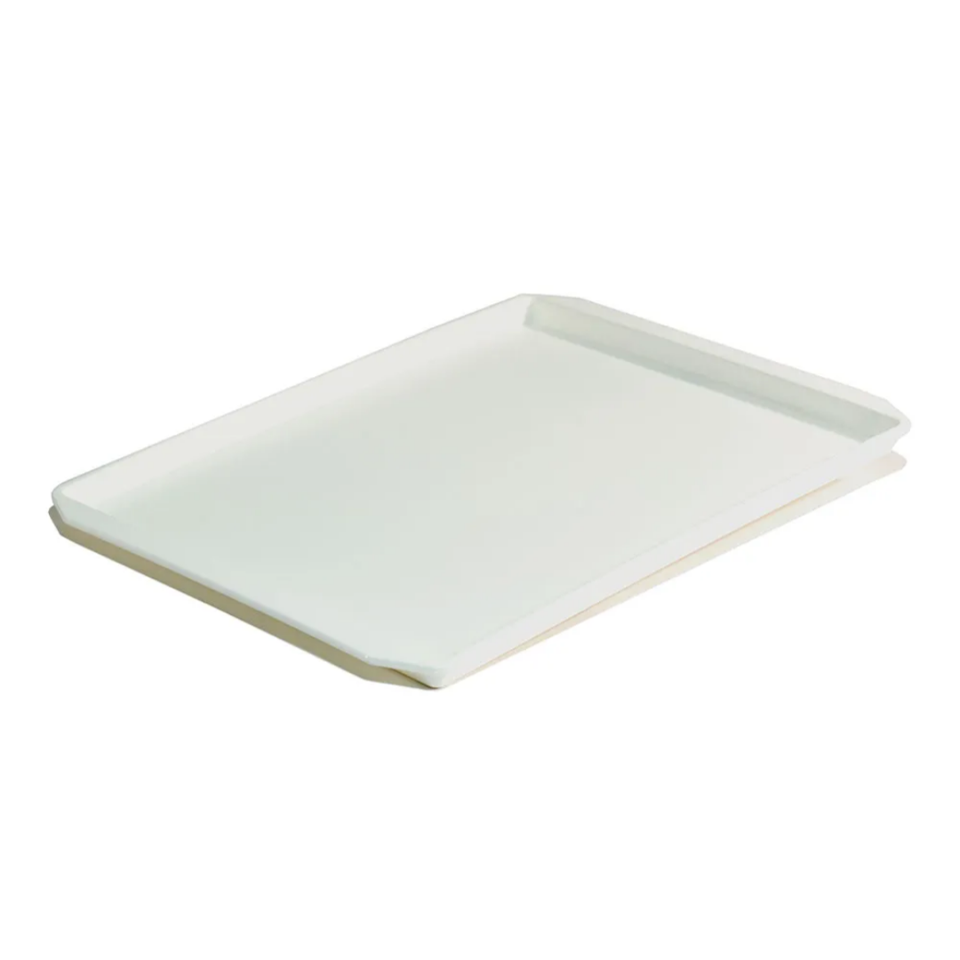 Rectangular white tray on a white background