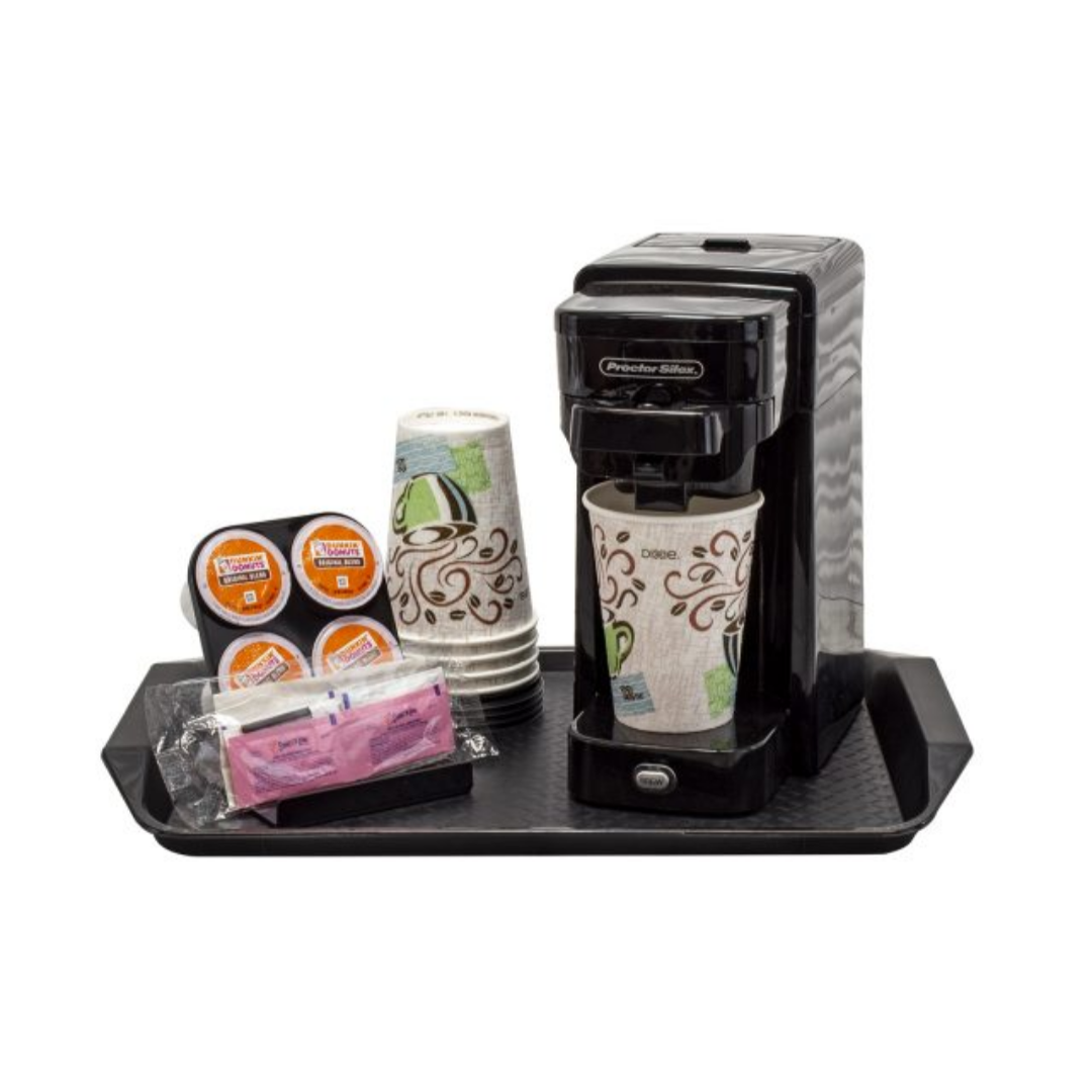 Coffee maker with paper cups and packets on a tray against a white background