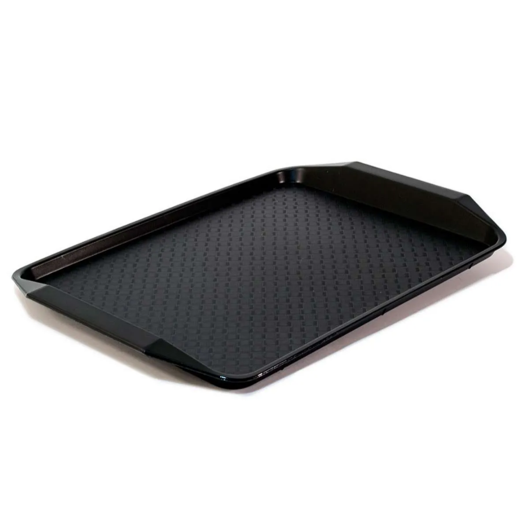 Black baking tray with textured surface on a white background