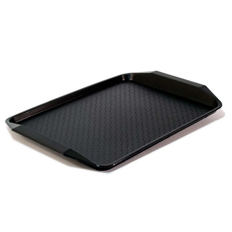 Black baking tray with textured surface on a white background