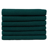 Pictured: Neatly folded stack of 6 green towels against a white background. These towels are in the shade Hunter Green.