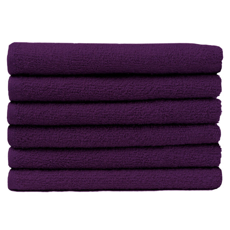 Pictured: Neatly folded stack of 6 purple towels against a white background. These towels are in the shade Eggplant.