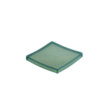 Green square glass object on a white background