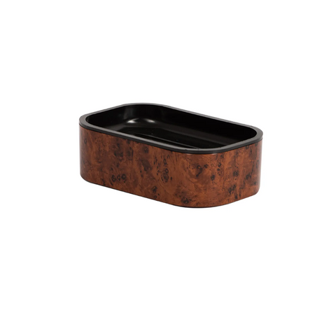 Rectangular ceramic dish with brown exterior and black interior on a white background