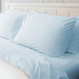 High quality hotel linens including pillowcases, fitted sheets, flat sheets and duvet covers. Light sky blue color. 