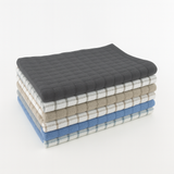 Stack of 6 kitchen towels in various colors - dark grey, white/grey check, beige, beige/white check, blue and blue/white check.