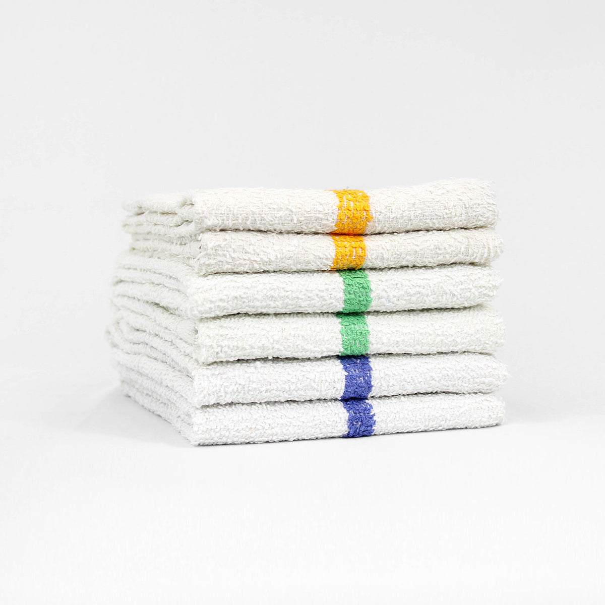 Pictured: Six white bar mops with a colored stripe down the middle neatly folded and stacked against a white background. There are two of each colored stripe. From top to bottom the colors are: Gold, Green and Blue.