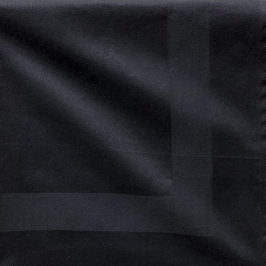 Pictured: Square black napkin with a satin band acting as a border in the middle. 