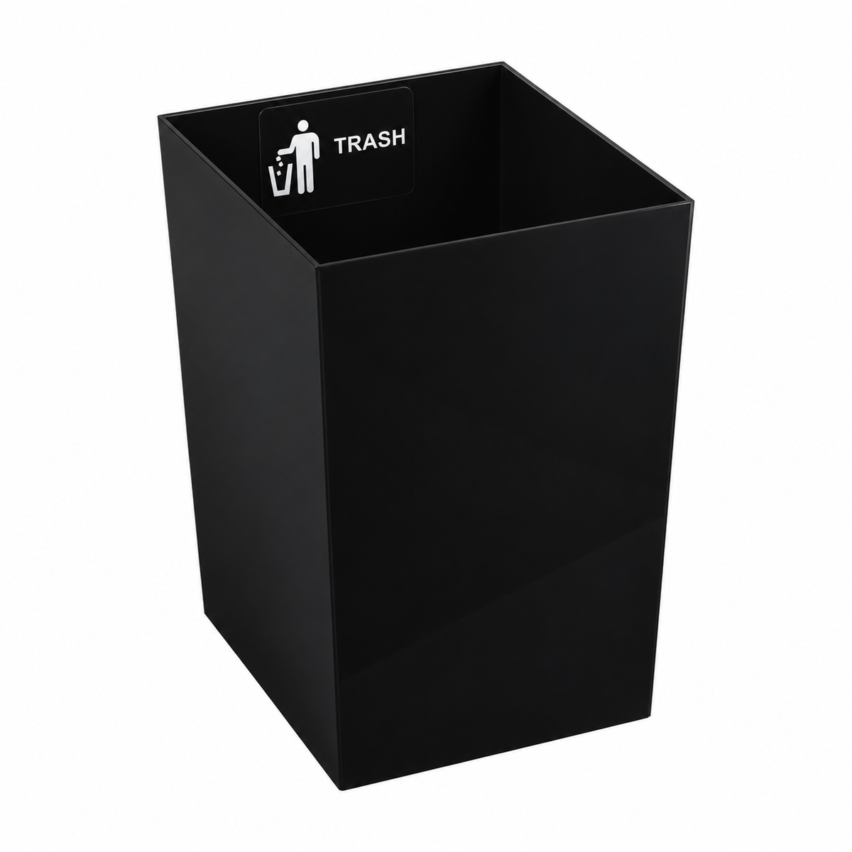 Pictured: The black bin insert that is labelled TRASH against a white background.