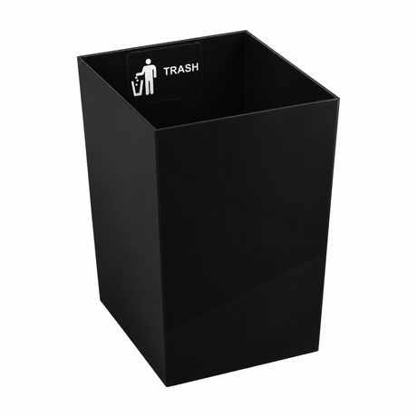 Pictured: The black bin insert that is labelled TRASH against a white background.