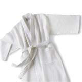 Pictured: Boca Terry white Kimono Robe with waffle texture laid out against a white background.