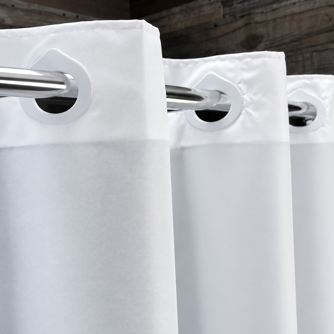 Pictured: Close-up shot of the Hang2It Nylon Shower Curtain, highlighting the hookless feature of the curtains.