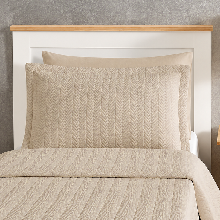 Pictured: Close-up of the Flourish Quilt Pillow Sham in the shade Sand.