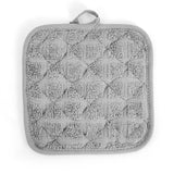 Pictured: Closeup of the Martex pot holder against a white background. This pot holder is in the shade Solid Gray.