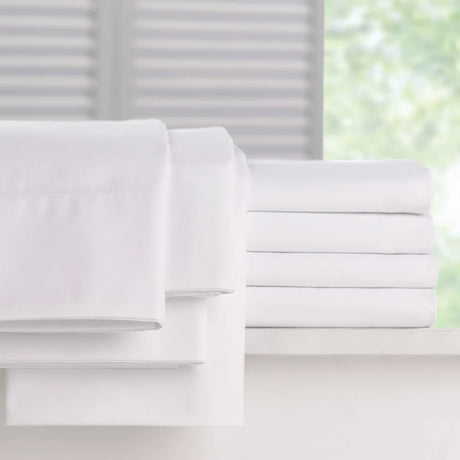 Pictured: Millennium T-250 Sheets neatly folded and stacked on a windowsill. 