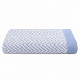 Pictured: Folded Fibertone Chevron Jacquard Pool Towel against a white background. This towel is in the shade "Porcelain".