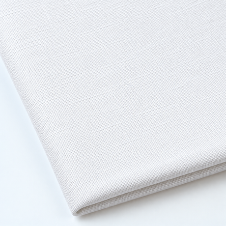 Pictured: Close up of the Premier Napkin neatly folded in the shade White against a white background.