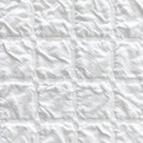 Pictured: Extreme closeup of the jacquard style top sheet. You can see the detail and the texture of the blanket here.