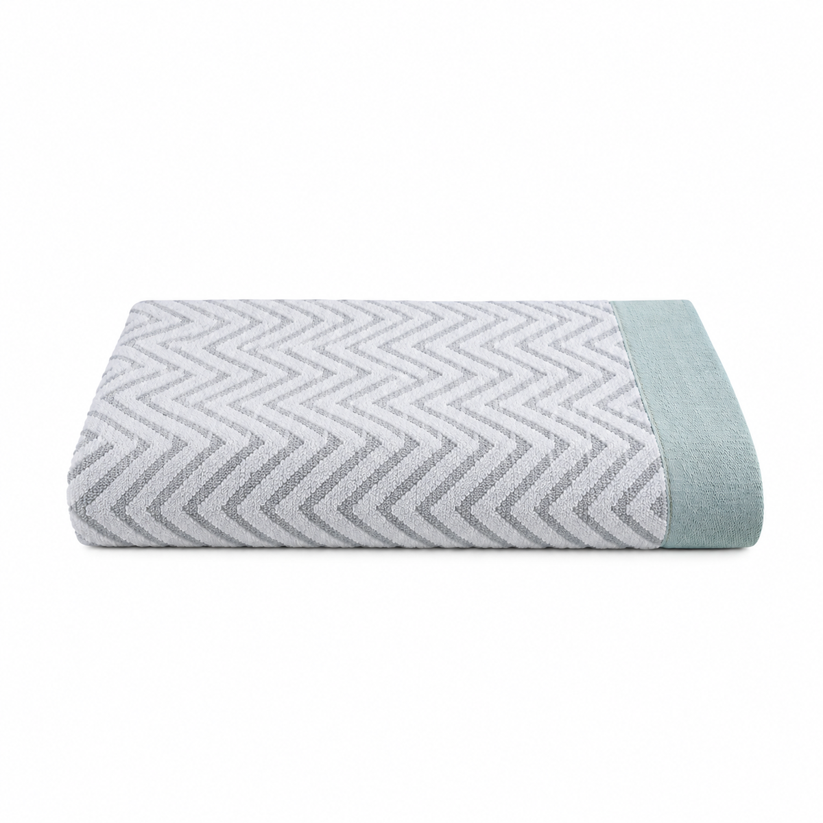 Pictured: Folded Fibertone Chevron Jacquard Pool Towel against a white background. This towel is in the shade "Seafoam".