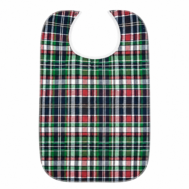 Pictured: Highland Plaid Vinyl Bib Clothing Protector against a white background. The bib is green, red, white, and navy. It features a Velcro enclosure for a secure fit.